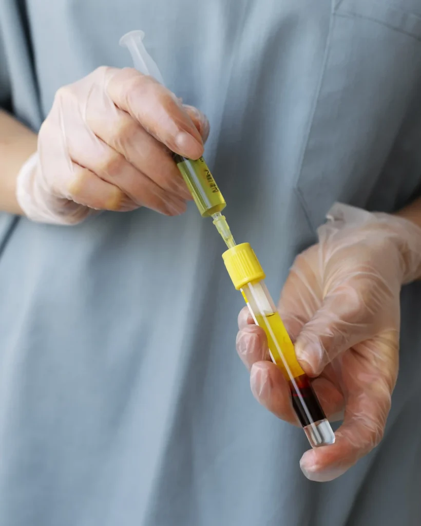 front-view-healthcare-professional-holding-vial-injection